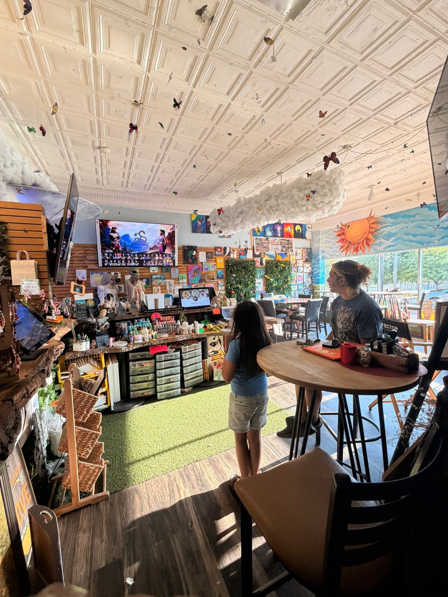 The colorful, art-filled interior of A Walk in the Park Cafe